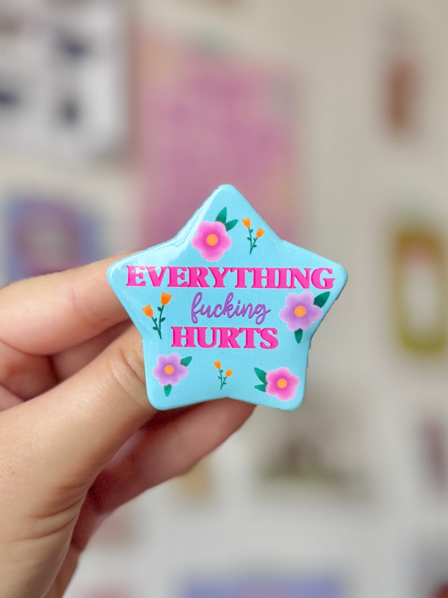 Everything Hurts - Badge
